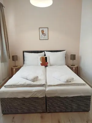 Ein Bett oder Betten in einem Zimmer der Unterkunft Luxus Ottakring
