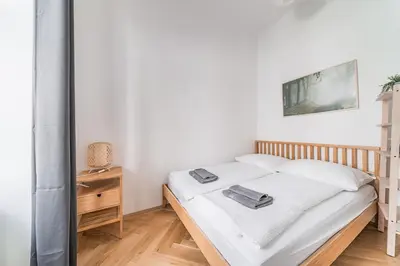 Ein Bett oder Betten in einem Zimmer der Unterkunft Trendy Schönbrunn Apartment