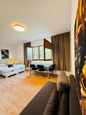 Ein Sitzbereich in der Unterkunft Central 8BR Apt, with Garden & Tarrace, Sleeps 17