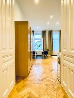Ein Sitzbereich in der Unterkunft Comfortable 1BR Apartment By Westbahnhof