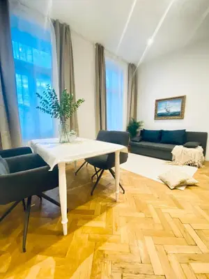 Ein Sitzbereich in der Unterkunft Comfortable 1BR Apartment By Westbahnhof