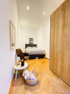 Ein Bett oder Betten in einem Zimmer der Unterkunft Spacious 2BR Apartment 7 Min from Westbahnhof