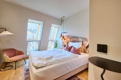 Ein Bett oder Betten in einem Zimmer der Unterkunft Hotel Karol