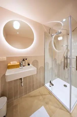 Ein Badezimmer in der Unterkunft Hotel Karol
