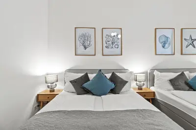 Ein Bett oder Betten in einem Zimmer der Unterkunft Near Innere Stadt 3min walk to U4 Friedensbrücke