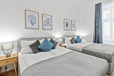 Ein Bett oder Betten in einem Zimmer der Unterkunft Near Innere Stadt 3min walk to U4 Friedensbrücke