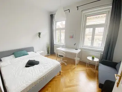 Ein Bett oder Betten in einem Zimmer der Unterkunft Modern, Bright, Spacious 3-Room-Apartment in a Nice Area of Vienna