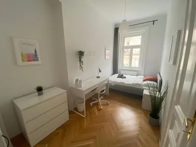 Ein Bett oder Betten in einem Zimmer der Unterkunft Modern, Bright, Spacious 3-Room-Apartment in a Nice Area of Vienna