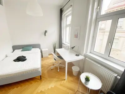 Ein Bett oder Betten in einem Zimmer der Unterkunft Modern, Bright, Spacious 3-Room-Apartment in a Nice Area of Vienna