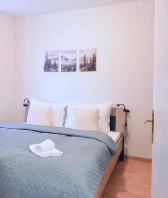 Ein Bett oder Betten in einem Zimmer der Unterkunft Modern Apartment near Vienna Central Station