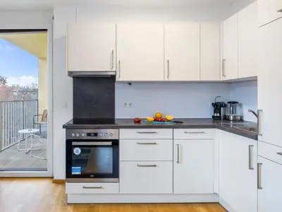 Küche/Küchenzeile in der Unterkunft Modern City Apartment near Vienna Central Station