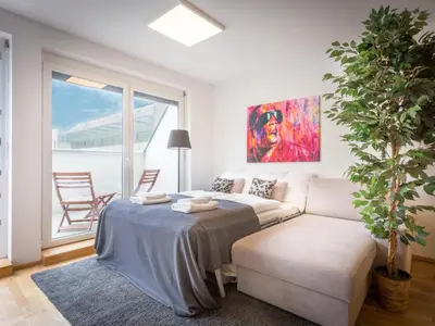 Ein Bett oder Betten in einem Zimmer der Unterkunft Modern City Apartment near Vienna Central Station