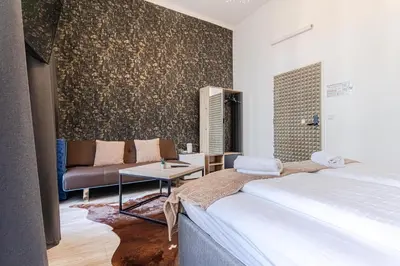 Ein Bett oder Betten in einem Zimmer der Unterkunft Sweet 3 Rooms Complex, Shopping Paradise Mariahilfer