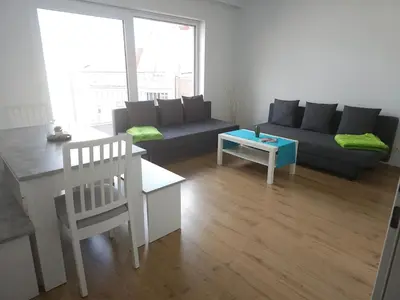 Ein Sitzbereich in der Unterkunft Coming Home - Penthouse Apartment