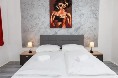 Ein Bett oder Betten in einem Zimmer der Unterkunft Vienna-Style Cozy Apartments