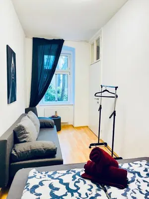 Ein Bett oder Betten in einem Zimmer der Unterkunft Comfy 3BR Apt for Groups, 10-Min to Währinger Park