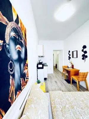Ein Bett oder Betten in einem Zimmer der Unterkunft Elegant Yet Affordable Palace Studio