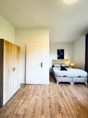 Ein Bett oder Betten in einem Zimmer der Unterkunft Budget Friendly House with Garden for 25 Guests