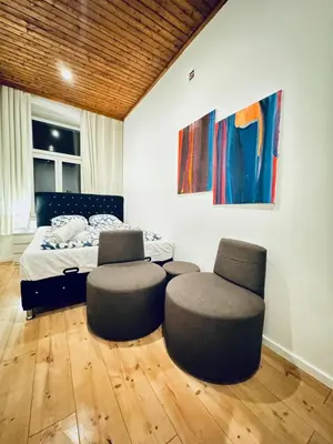 Ein Sitzbereich in der Unterkunft Elegant 5-Bedroom Residence Near Kaufpark Alterlaa