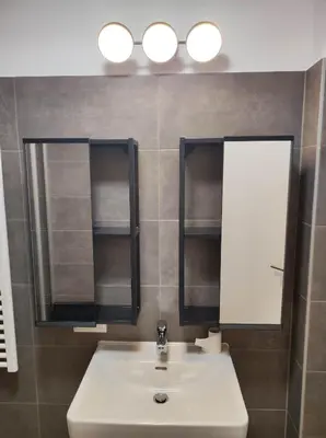 Ein Badezimmer in der Unterkunft Exklusives Studio gegenüber der Uno-City und Kaiserwasser
