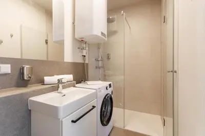 Ein Badezimmer in der Unterkunft New City Studio near Schönbrunn Palace & Metro U3