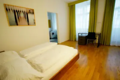 Ein Bett oder Betten in einem Zimmer der Unterkunft Schlossquadrat Apartment 17