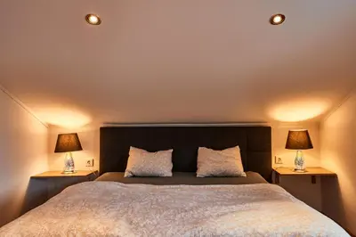 Ein Bett oder Betten in einem Zimmer der Unterkunft Elegant 3BD Holiday Home in Prime Location of Vienna