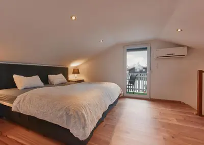 Ein Bett oder Betten in einem Zimmer der Unterkunft Elegant 3BD Holiday Home in Prime Location of Vienna