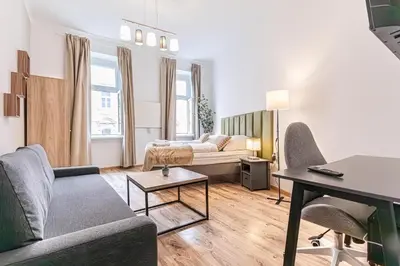 Ein Bett oder Betten in einem Zimmer der Unterkunft Stylish 1BR Apartment Near Schönbrunn & Westbahnhof Ideal for Longstays