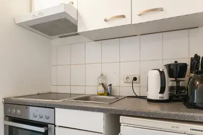 Küche/Küchenzeile in der Unterkunft Beautiful 1BR Apartment by Westbahnhof Station Great for Longstays