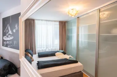 Ein Bett oder Betten in einem Zimmer der Unterkunft Vienna Deluxe Residences - Schönbrunn
