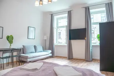 TV/Unterhaltungsangebot in der Unterkunft Comfy 2BR Apartment Best For Long Stay