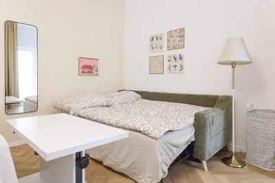 Ein Bett oder Betten in einem Zimmer der Unterkunft Renovated Central Apartment with Terrace