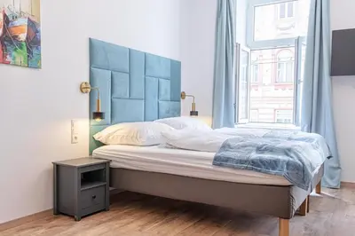 Ein Bett oder Betten in einem Zimmer der Unterkunft Comfy 1BR Apt in Great Location Ideal for Long Stay