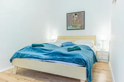 Ein Bett oder Betten in einem Zimmer der Unterkunft Sweet 2BR Apartment Perfect for Long Stays