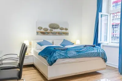 Ein Bett oder Betten in einem Zimmer der Unterkunft Sweet 2BR Apartment Perfect for Long Stays