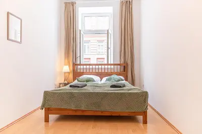 Ein Bett oder Betten in einem Zimmer der Unterkunft 3BR Apartment with Nice Location in Vienna For Long Stays