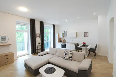 Ein Sitzbereich in der Unterkunft Céleste Suites
