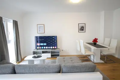 Ein Sitzbereich in der Unterkunft Céleste Suites