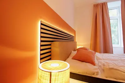 Ein Bett oder Betten in einem Zimmer der Unterkunft Stylish Home in Viennas Central 9th District