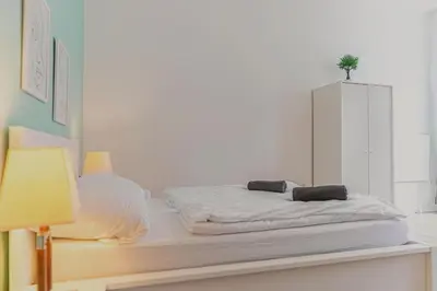 Ein Bett oder Betten in einem Zimmer der Unterkunft Budget Friendly 1BR Apt, Near Westbahnhof Station