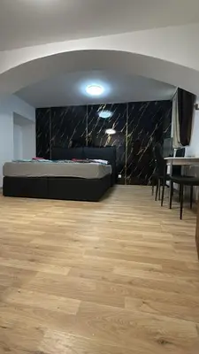 Ein Bett oder Betten in einem Zimmer der Unterkunft Lovely 1BR &1LR Apt with WiFi Near Amusement Park