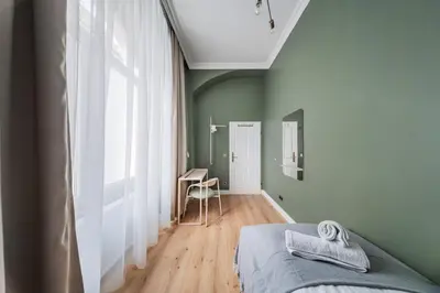 Ein Bett oder Betten in einem Zimmer der Unterkunft HOME1 - District 5 Boutique Hostel
