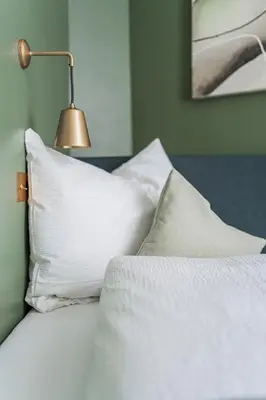 Ein Bett oder Betten in einem Zimmer der Unterkunft HOME1 - District 5 Boutique Hostel
