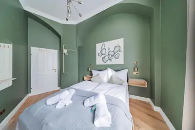 Ein Bett oder Betten in einem Zimmer der Unterkunft HOME1 - District 5 Boutique Hostel