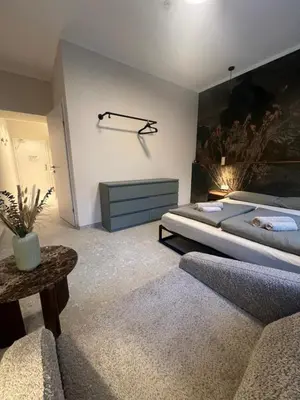 Ein Bett oder Betten in einem Zimmer der Unterkunft Residence K - Comfy Studio in Historic Townhouse