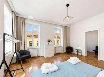 Ein Bett oder Betten in einem Zimmer der Unterkunft A&S Tivoli Apartment Vienna