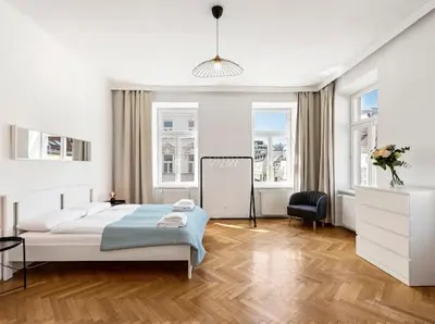 Ein Bett oder Betten in einem Zimmer der Unterkunft A&S Tivoli Apartment Vienna