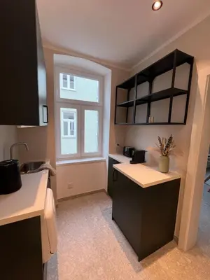 Küche/Küchenzeile in der Unterkunft Residence K - Authentic Charm & Modern Ease