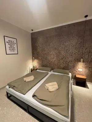 Ein Bett oder Betten in einem Zimmer der Unterkunft Residence K - Cozy Altbau Apartment Vienna